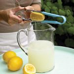 Strong tongs and a sieve give you perfectly squeezed lemons with no fuss